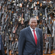 Interior cabinet secretary Joseph Nkaissery inspects piles of illegal firearms before they were set alight.